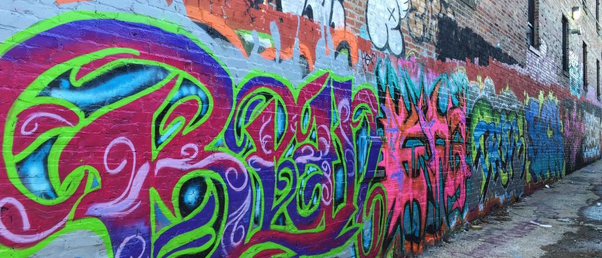 Beer-themed graffiti mural on the wall outside Border Brewing Company in Kansas City's Crossroads Arts District
