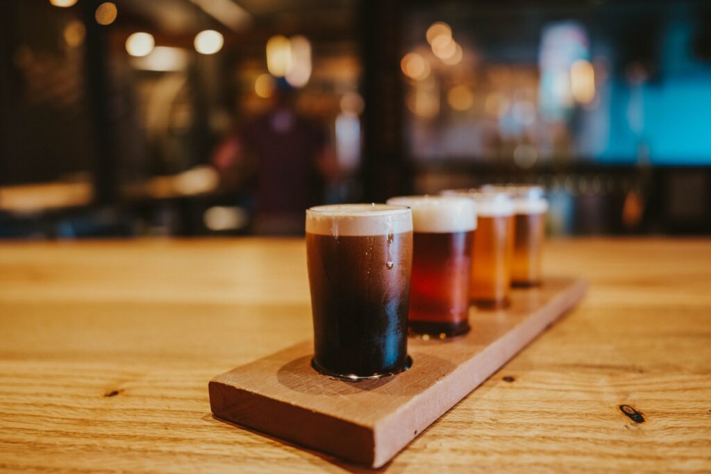 A beer tasting with ales and lagers for a guest at Border Brewing Company in Kansas City, MO