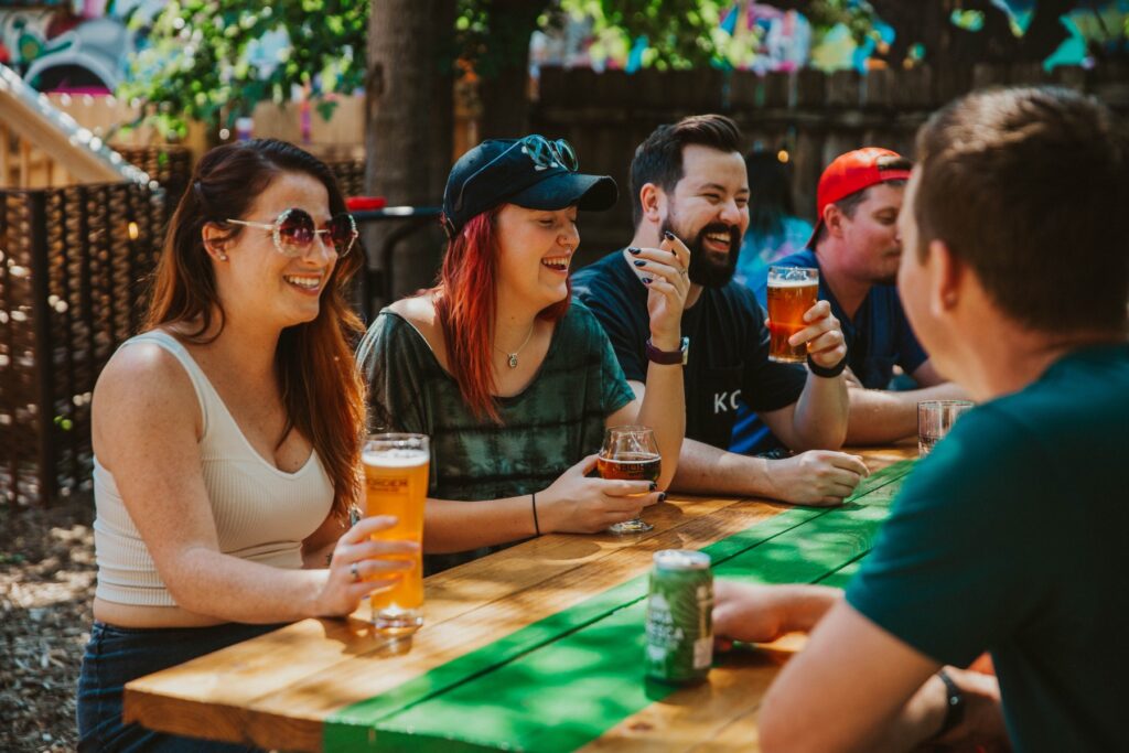 Customers having a great time on our patio at the taproom/brewery in Crossroads Art District KC