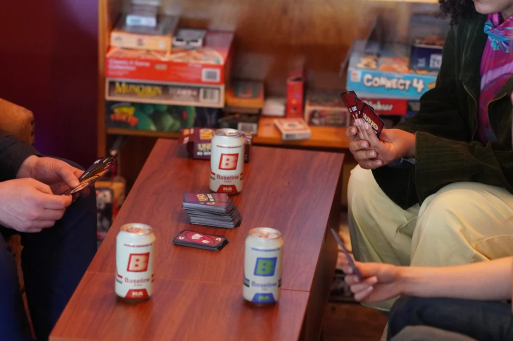 Beer drinkers enjoying the Non-Alcoholic beer Baseline Series by Border Brewing Company in KC