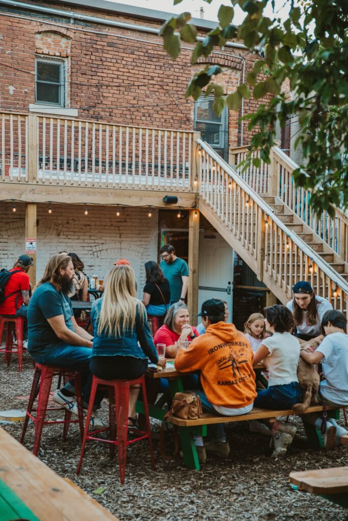 Fun party outside on the patio at our Border Brewing Company taproom in Crossroads Art District in KC