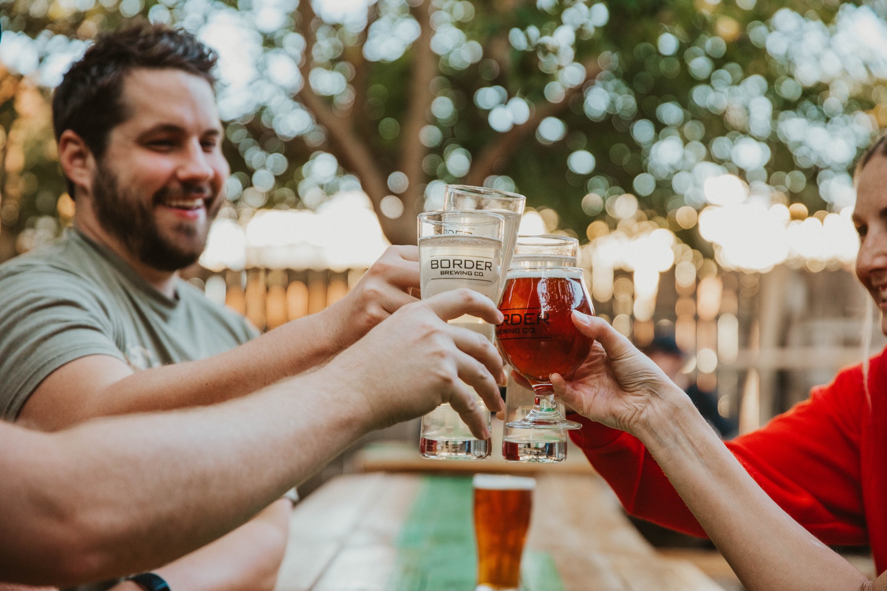 Happy Customers enjoying some Border Brews on our patio in Crossroads Art District in the heart of Kansas City, MO