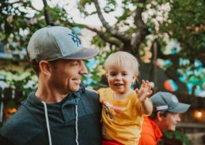 Happy father and son inside a local brewery in Kansas City, Border Brewing Company