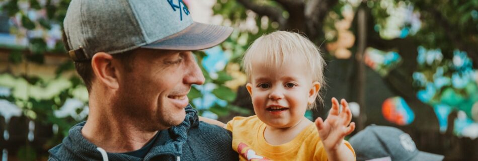 Happy father and son inside a local brewery in Kansas City, Border Brewing Company